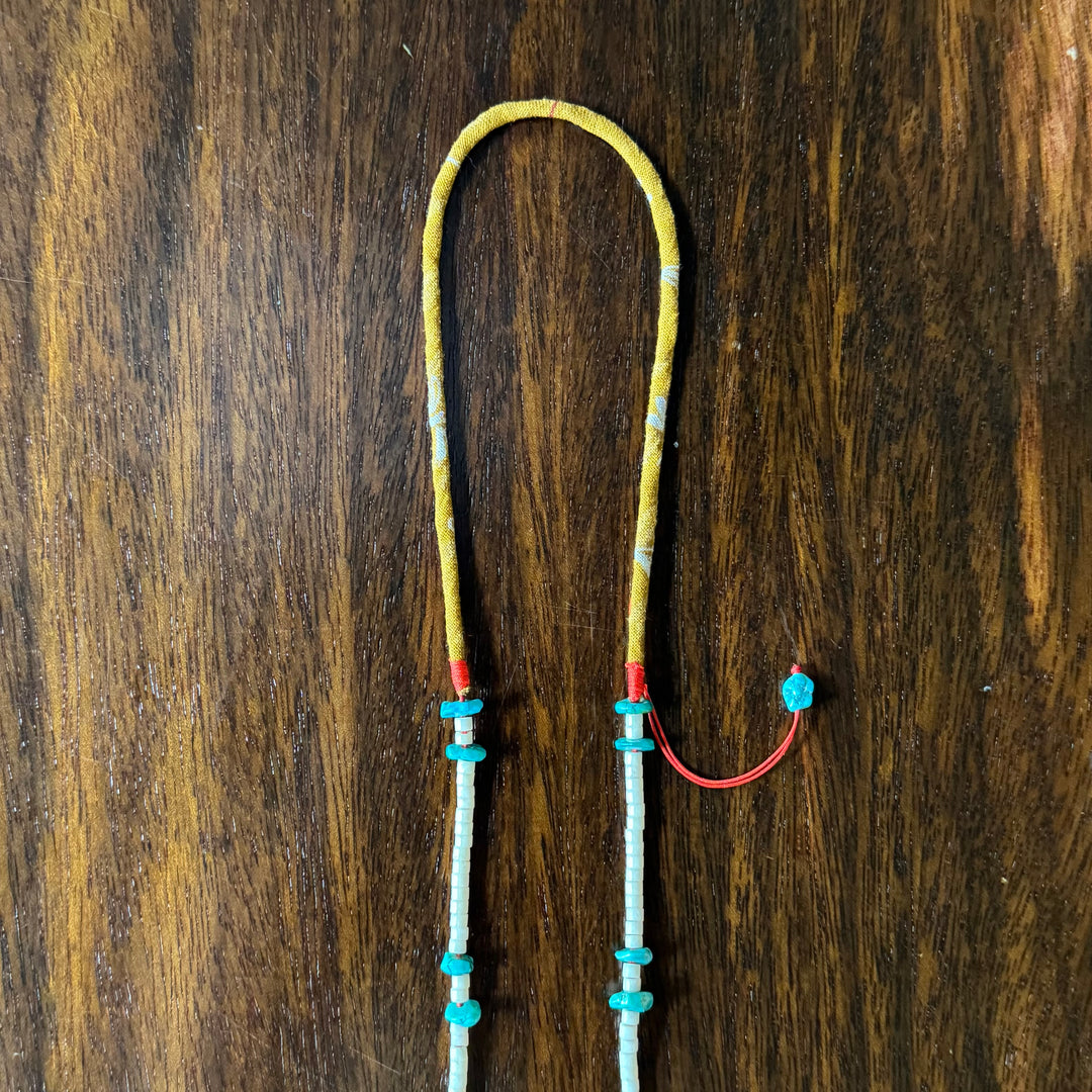 Volney 776 turquoise cloth necklace yellow